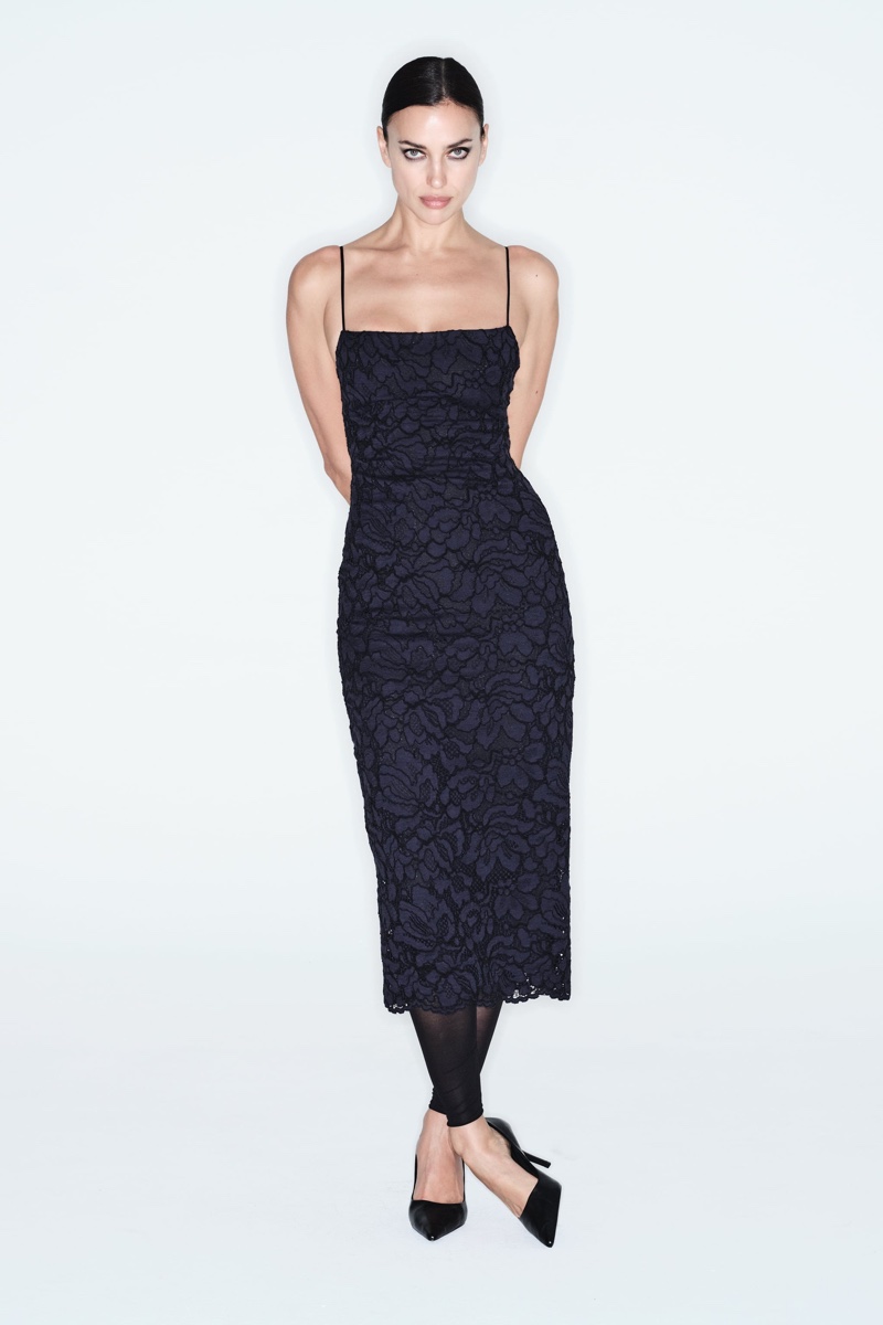 Irina Shayk poses in lace midi dress by Zara paired with timeless black heels.