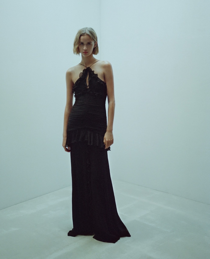 Mango spotlights a black dress with ruffle details for its holiday 2023 capsule line.