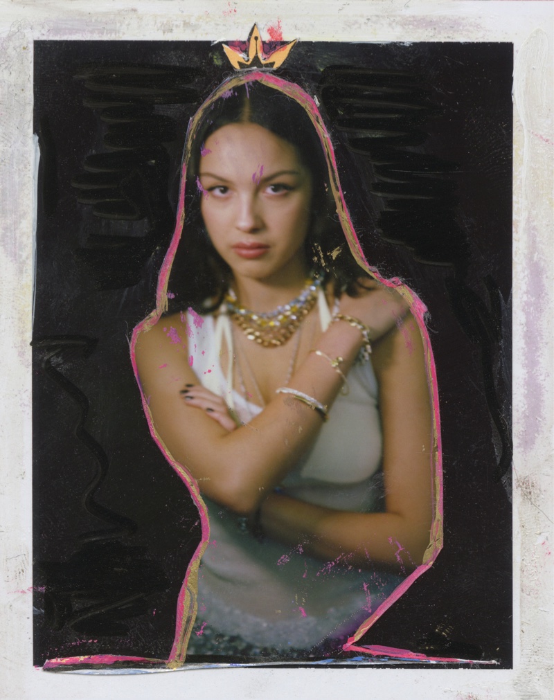 Olivia Rodrigo is depicted with an illustrated crown, her gaze piercing through the painted frame.