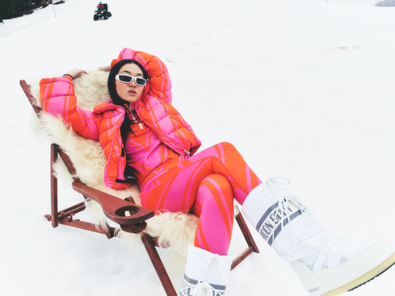 Perfect Moment's neon-pink ski suit and coral jacket for slope style.