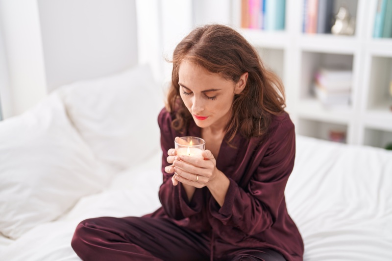 Woman Holding Candle