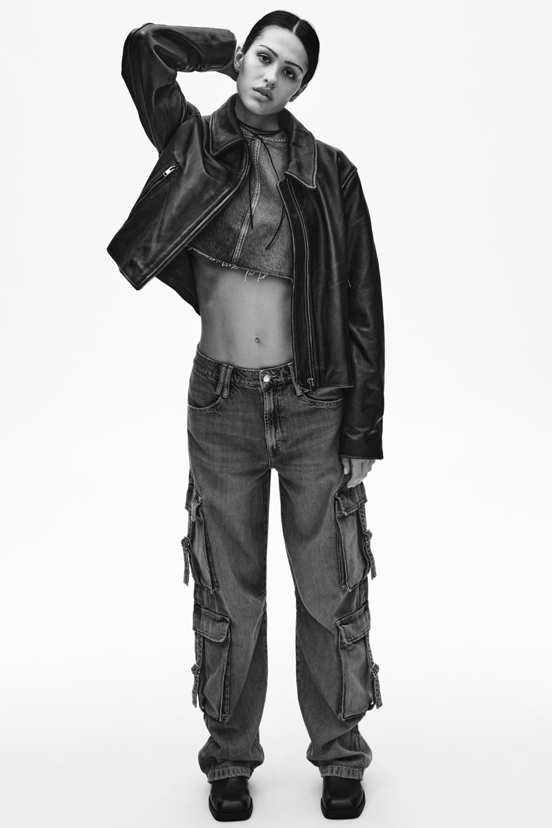 Amelia Gray models Zara TRF mid-rise TRF cargo jeans with leather jacket and cropped denim top.
