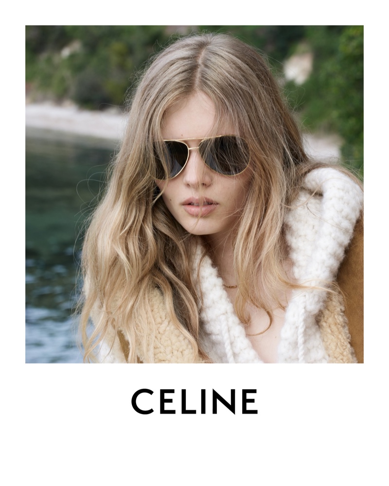 Ida Heiner dons a luxurious shearling vest and aviator sunglasses in Celine's Les Grandes Classiques 07 collection.