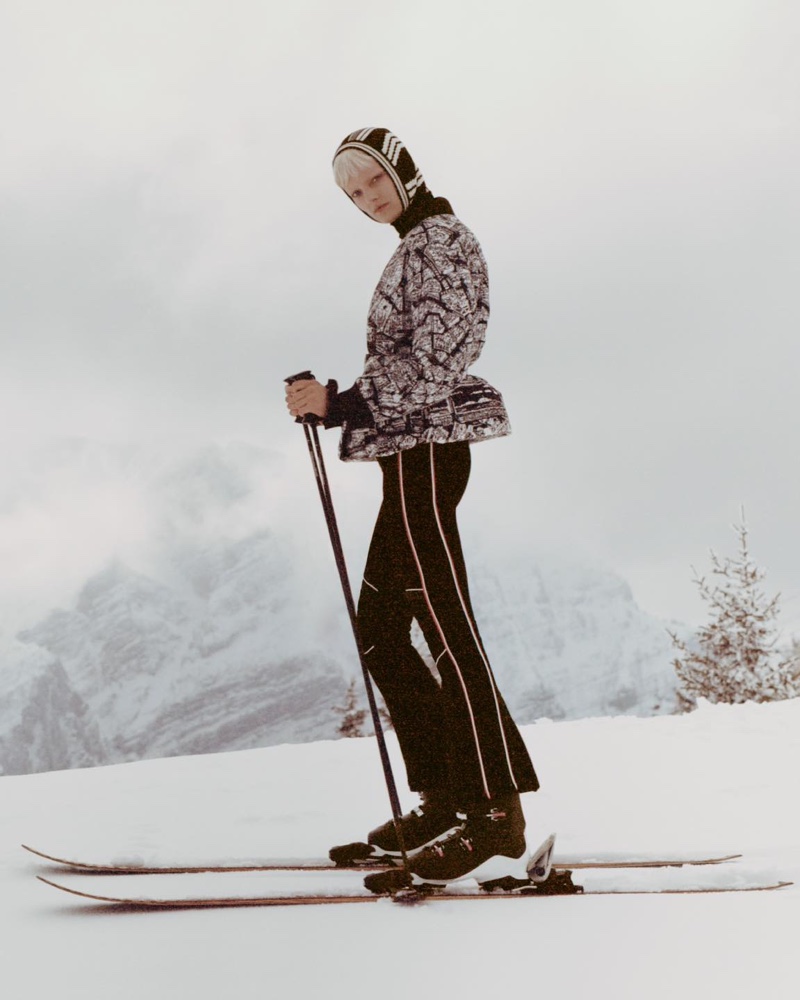 Ready to hit the slopes, Maaike Klaasen dons a chic, patterned DiorAlps jacket and ski pants, embodying winter elegance.