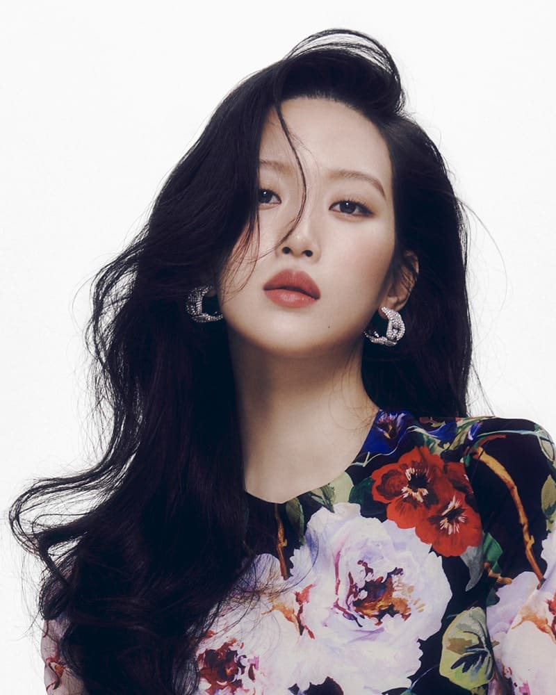 Moon Ga-young embodies floral sophistication in Dolce & Gabbana, adorned with statement earrings and a bloom of colors.