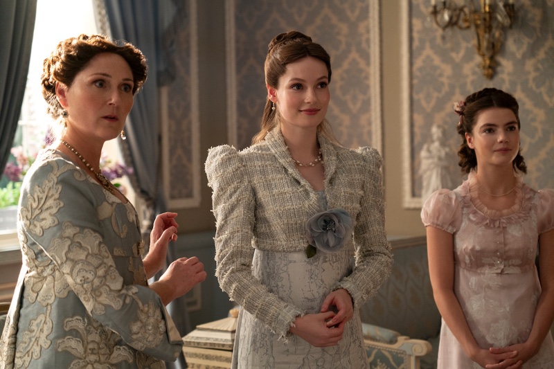 Ruth Gemmell, Florence Hunt, and Hannah Dodd are poised in pastels reflecting Bridgerton’s high society looks for season 3.