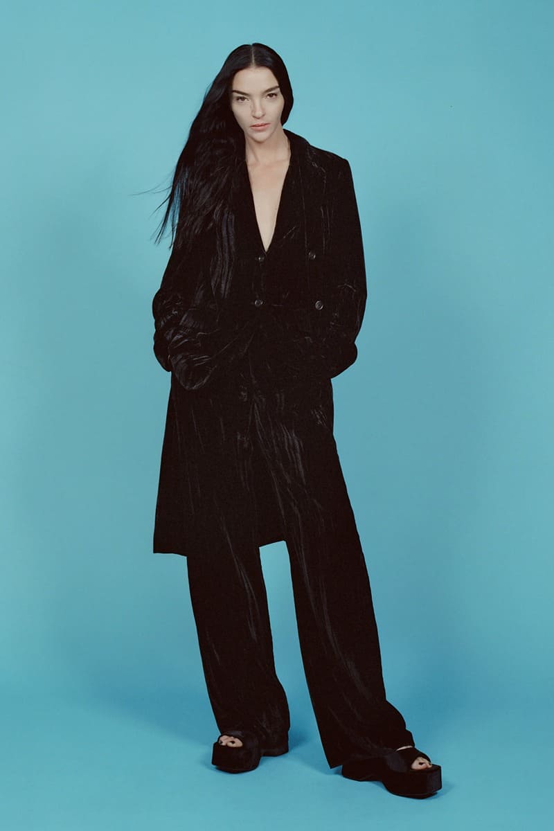 Mariacarla Boscono channels chic winter vibes in Zara's 2023 party collection, featuring a plush crinkled velvet coat, blazer, and trousers.