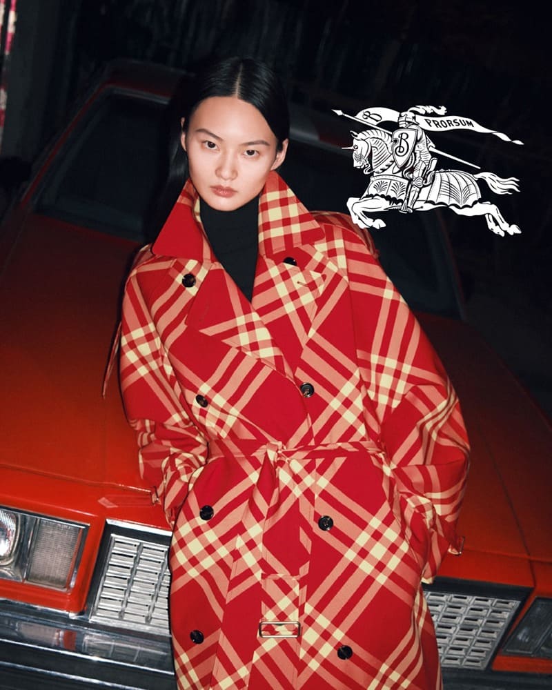 Striking red checks define Burberry's Lunar New Year 2024 campaign, featuring a modern twist on the classic trench.