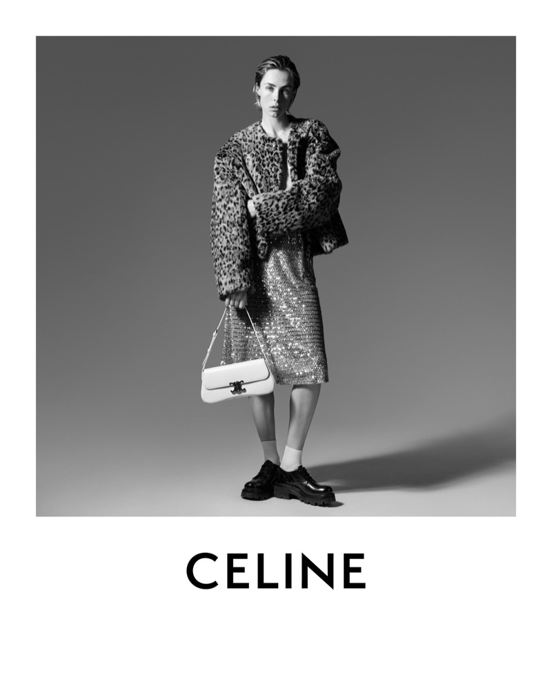 Celine's summer 2024 Tomboy collection is elegantly presented by Edie Campbell, featuring a leopard print jacket over a shimmering skirt.