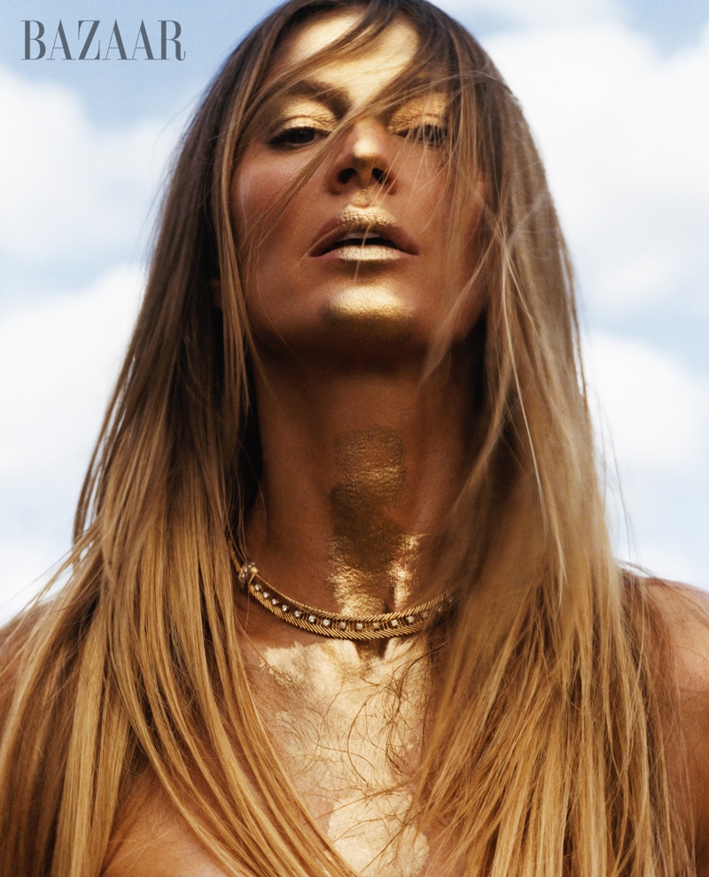 Supermodel Gisele Bundchen shines like gold in a Van Cleef & Arpels necklace.