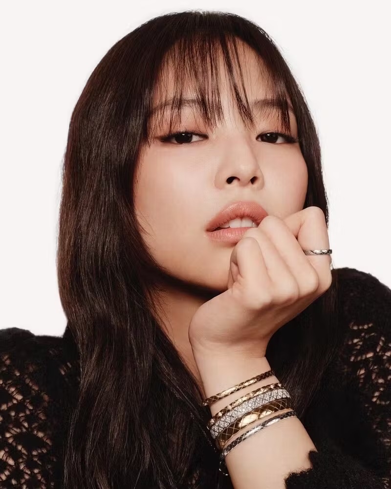 Blackpink's Jennie shines in Chanel's 2024 Coco Crush collection, wearing stacked and glittering bracelets.