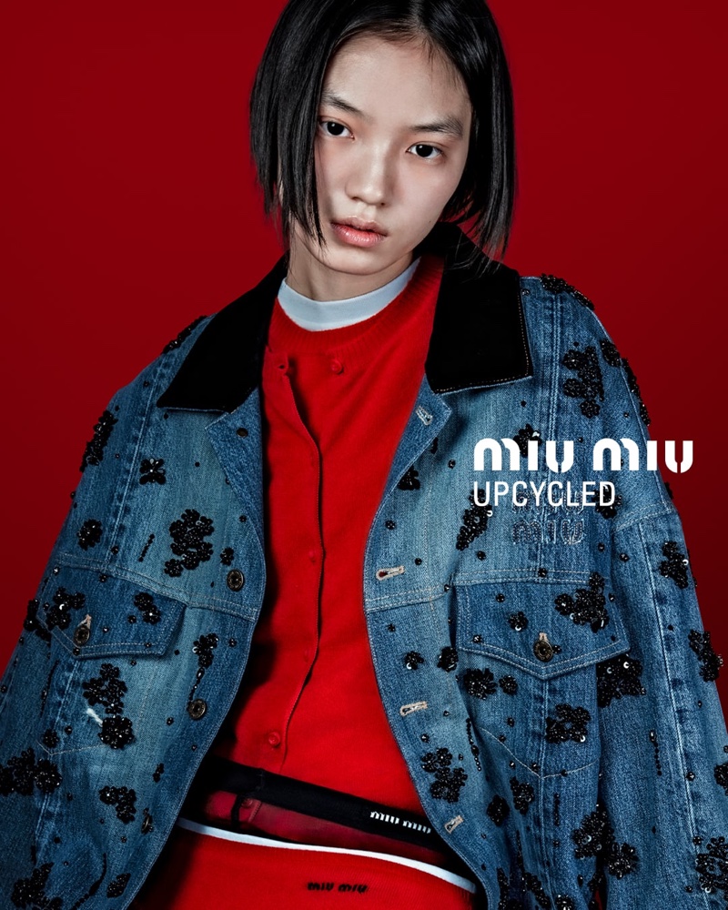 Sparkle meets sustainability in Miu Miu Upcycled's denim designs for 2024 modeled by Huijia Chen.