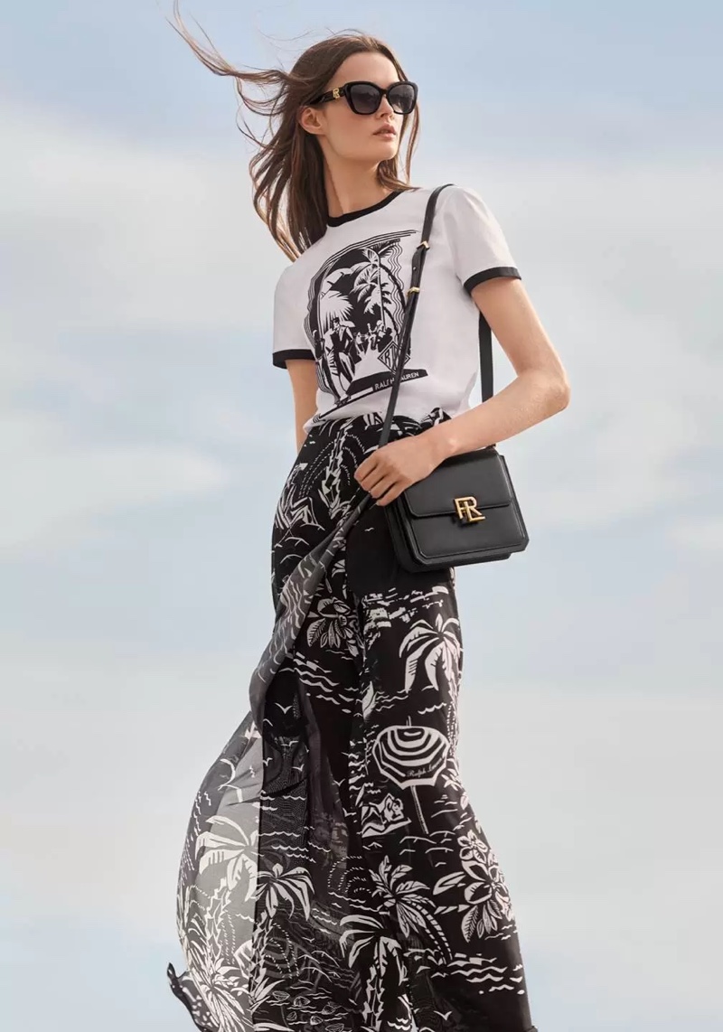 Ralph Lauren resort 2024 showcases a breezy elegance with a printed maxi skirt and a crisp, graphic t-shirt.