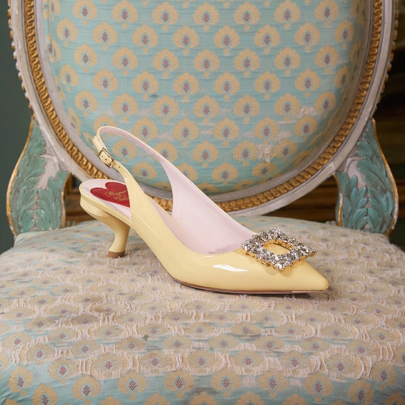 Roger Vivier spotlights the Virgule Strass slingback pumps for the spring 2024 season.