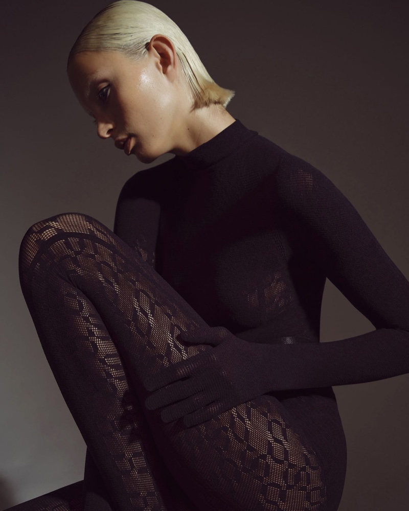 Wolford and Simkhai showcase a sheer pattern warp knit top with attached gloves.