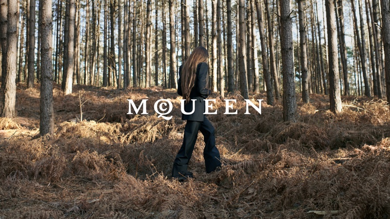 Solitary elegance amidst autumnal hues, featuring an Alexander McQueen suit by Seán McGirr.