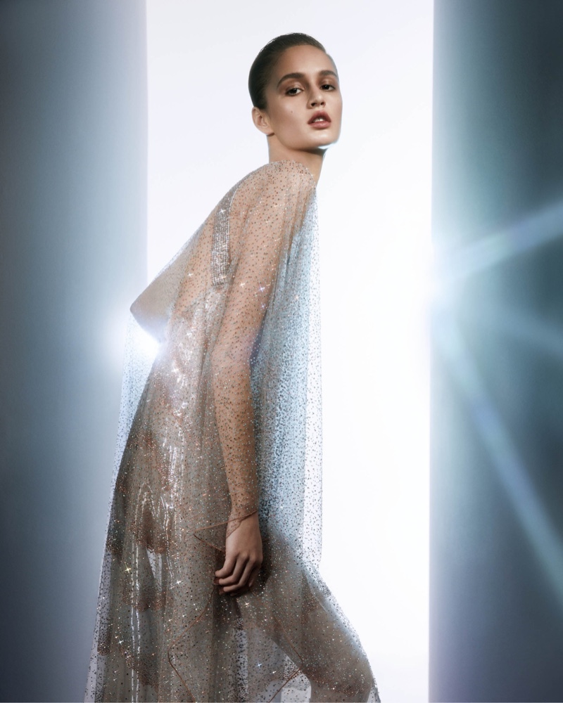 Giorgio Armani spotlights a sparkling sheer gown for its spring-summer 2024 collection.