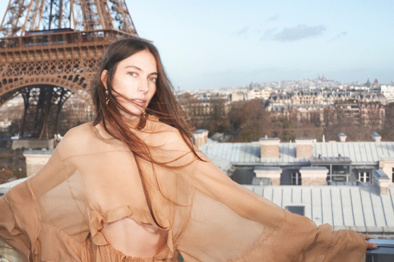 Chloé Portraits features Jessica Miller in a billowing silhouette against the Paris skyline.