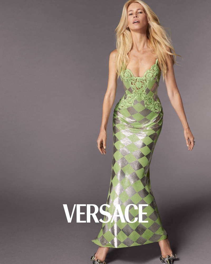 Claudia Schiffer poses in green diamond-patterned gown for Versace spring 2024 ad.