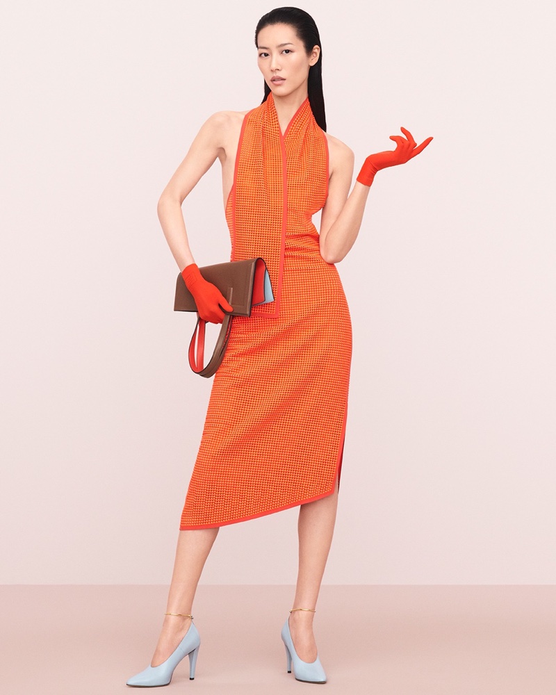 Liu Wen fronts the Fendi spring 2024 ad and showcases a halterneck dress paired with vibrant gloves and a Flip bag.