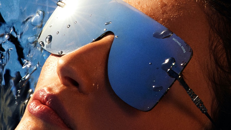 A focus on MICHAEL Michael Kors mirrored sunglasses featured in spring-summer 2024 campaign.