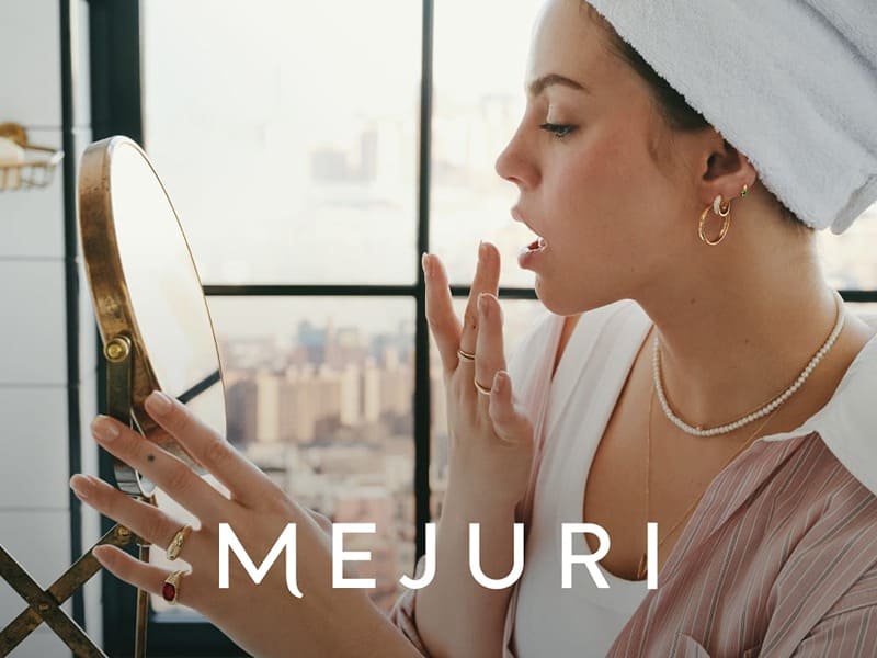 Reneé Rapp readies for the day in Mejuri's latest ad campaign, spotlighting hoops.