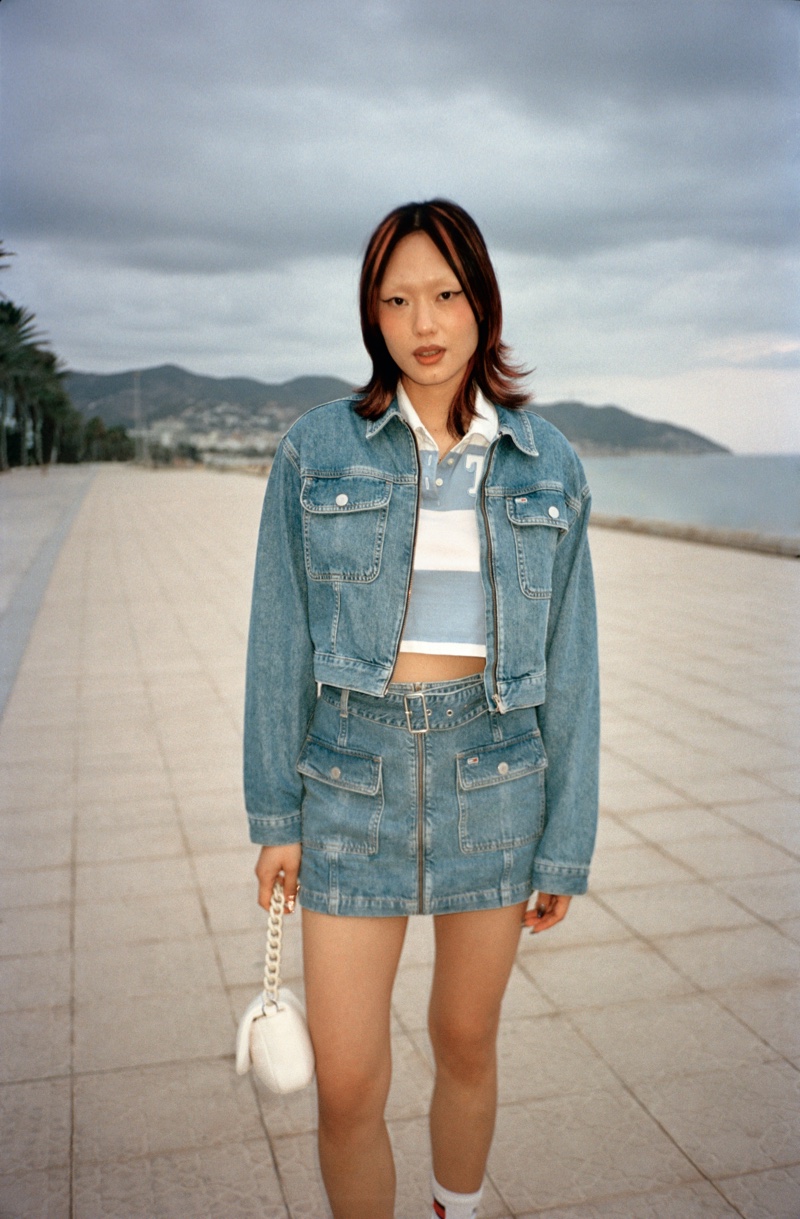 Kicki Yang Zhang wears double denim with a twist of sporty chic defines Tommy Jeans' spring-summer 2024 campaign.