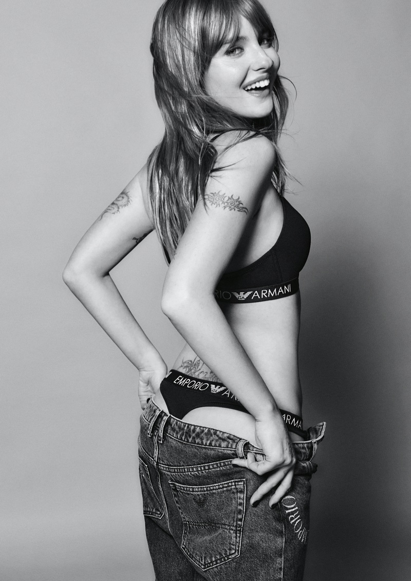 Flaunting her figure, Victoria De Angelis wears jeans with branded underwear from Emporio Armani.