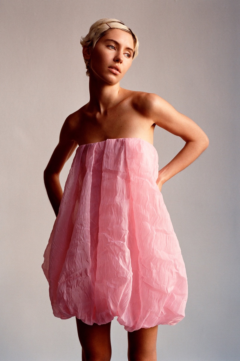 Iris Law captivates in a billowy pink bubble dress, a highlight of Zara's Valentine's collection.