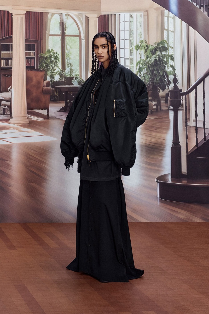 Simone Embrack wears double sleeve bomber and pants skirt in Balenciaga summer 2024 campaign.
