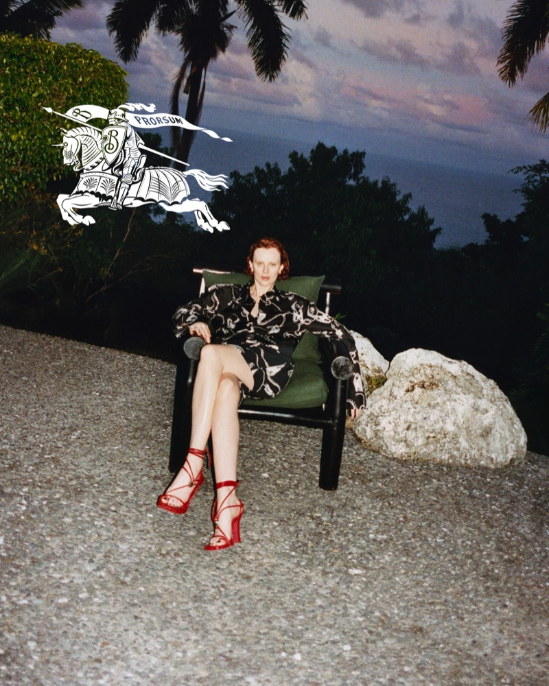 Dramatic nights: Karen Elson in a patterned black dress and red heels for Burberry's summer 2024 campaign.