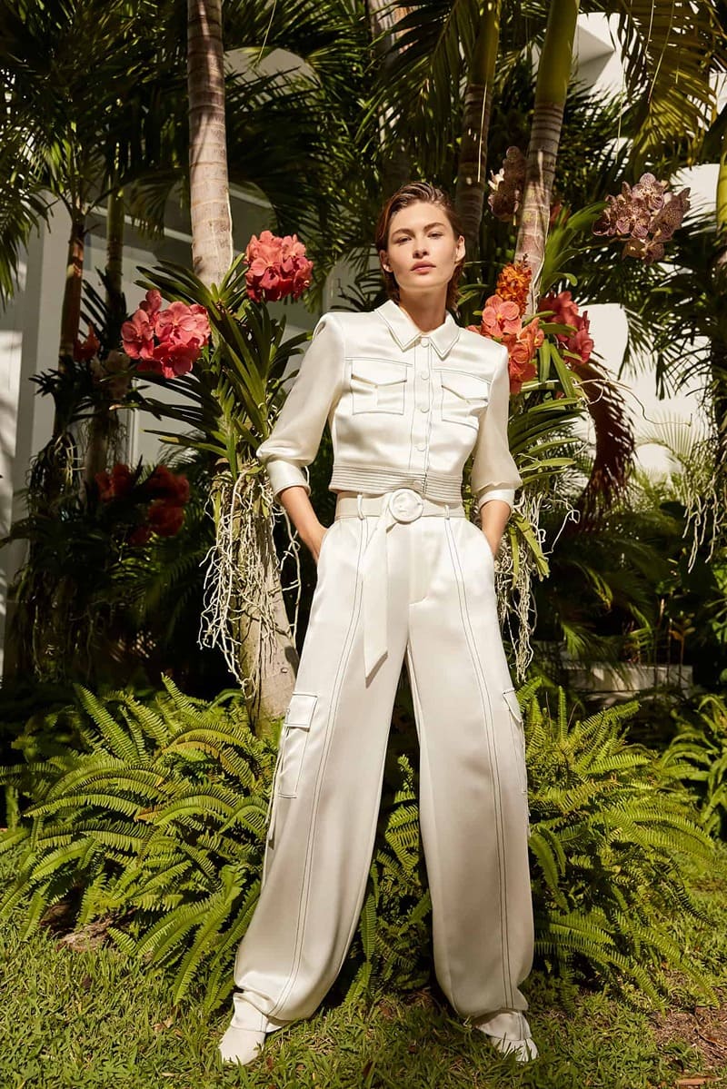 Cinq à Sept showcases a monochromatic masterpiece with Grace Elizabeth for their spring 2024 line, framed by nature's vibrancy.