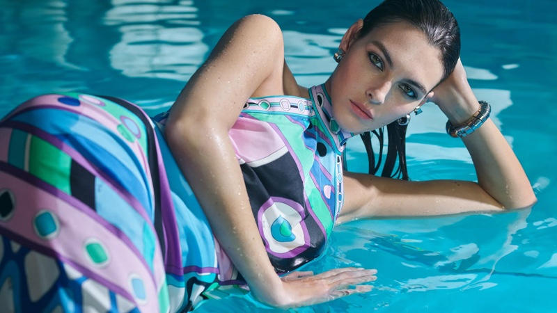 Submerged in water, Vittoria Ceretti models an eye-catching Emilio Pucci dress for the Very Vivara 2024 campaign.