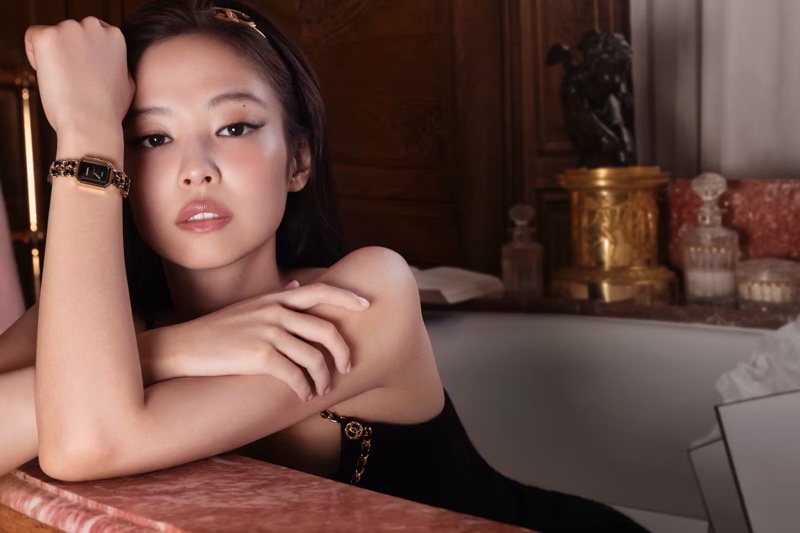 Jennie, poised and elegant, presents the Chanel Première Édition Originale watch while posing at the Ritz Paris.