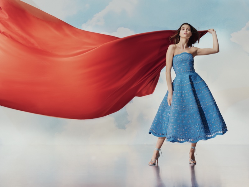 Embracing the breeze, Luna Bijl fronts Neiman Marcus's spring 2024 campaign in an Oscar de la Renta dress.