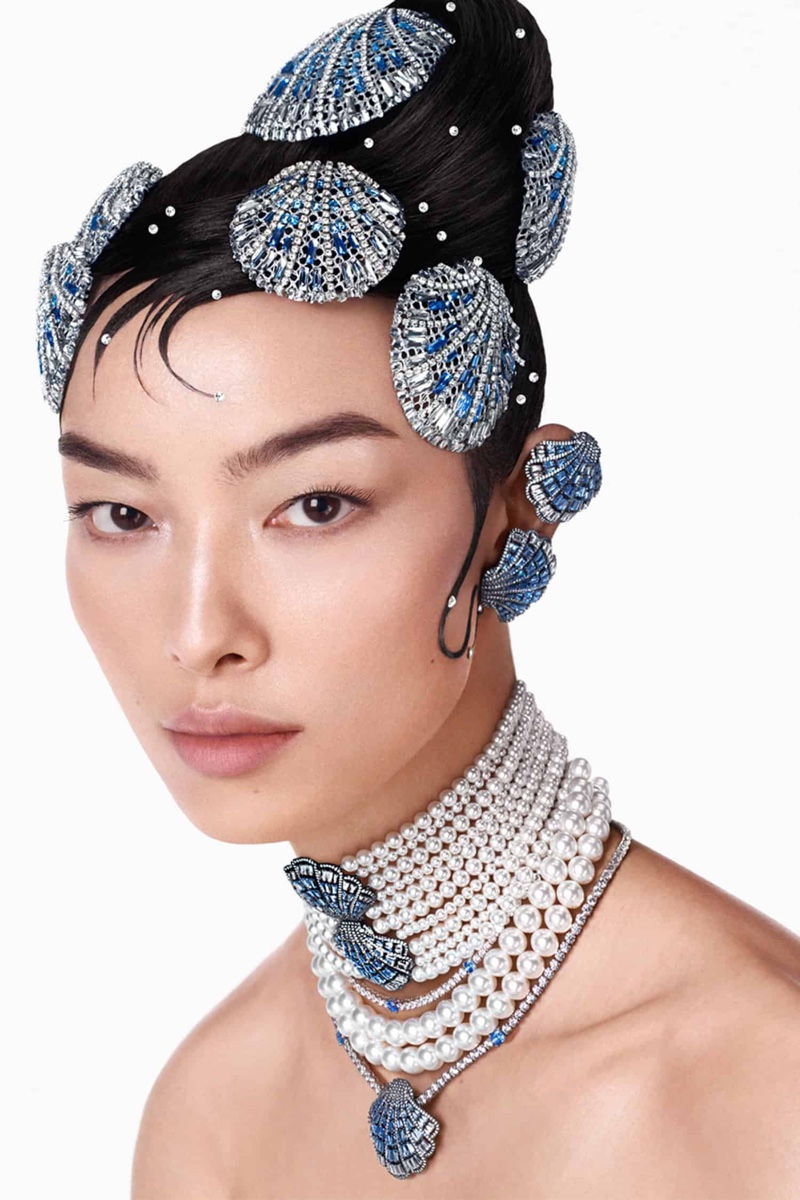 Fei Fei Sun wears a captivating blend of pearls and blue crystals for the Swarovski spring-summer 2024 ad.