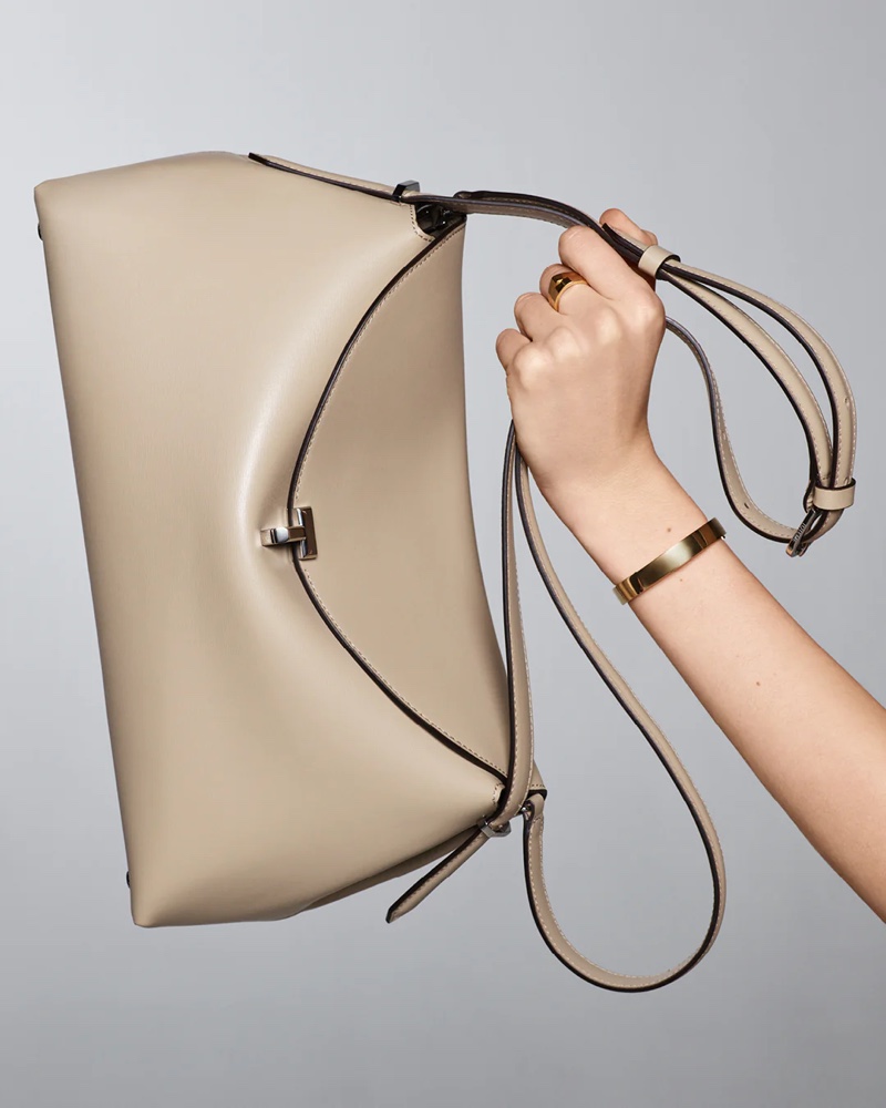 TOTEME spotlights the T-Lock top handle bag for its spring-summer 2024 campaign.
