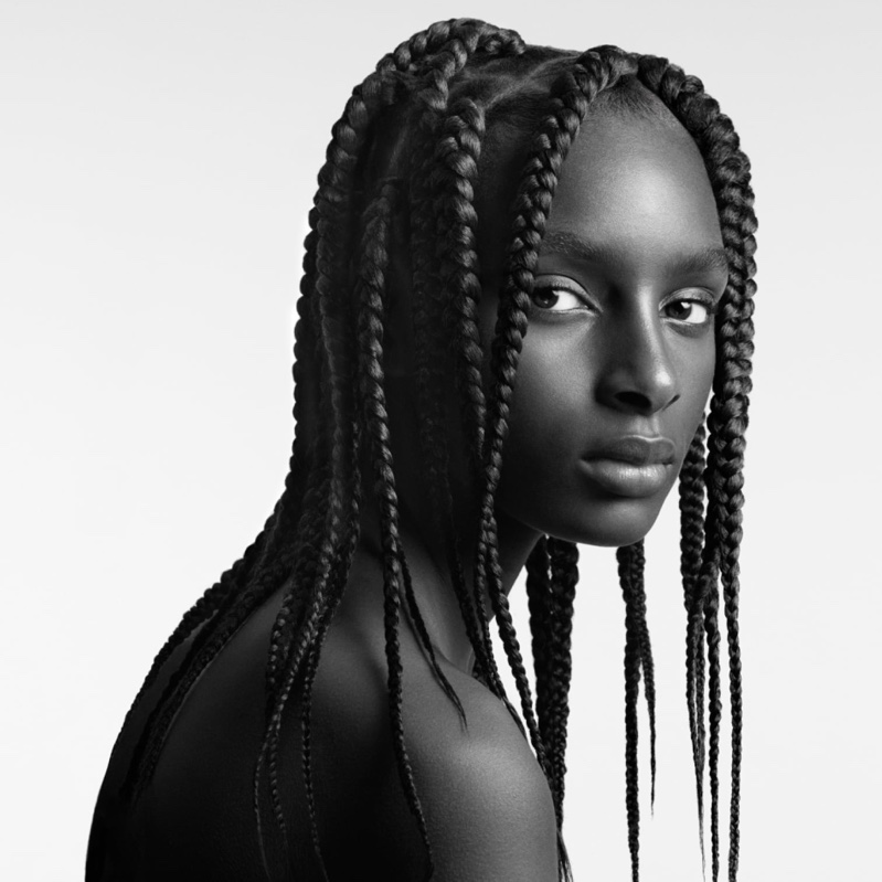 Fatou Seck shows off long braids for the Zara Hair line made with Guido Palau.