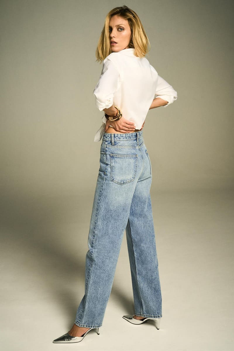 Anja Rubik accentuates classic style in Zara's high waisted vintage wash jeans for spring 2024.