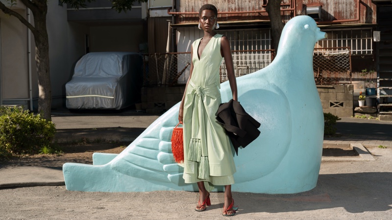Awar Odhiang gets chic in Bottega Veneta's summer 2024 breezy dress and bold accessories.