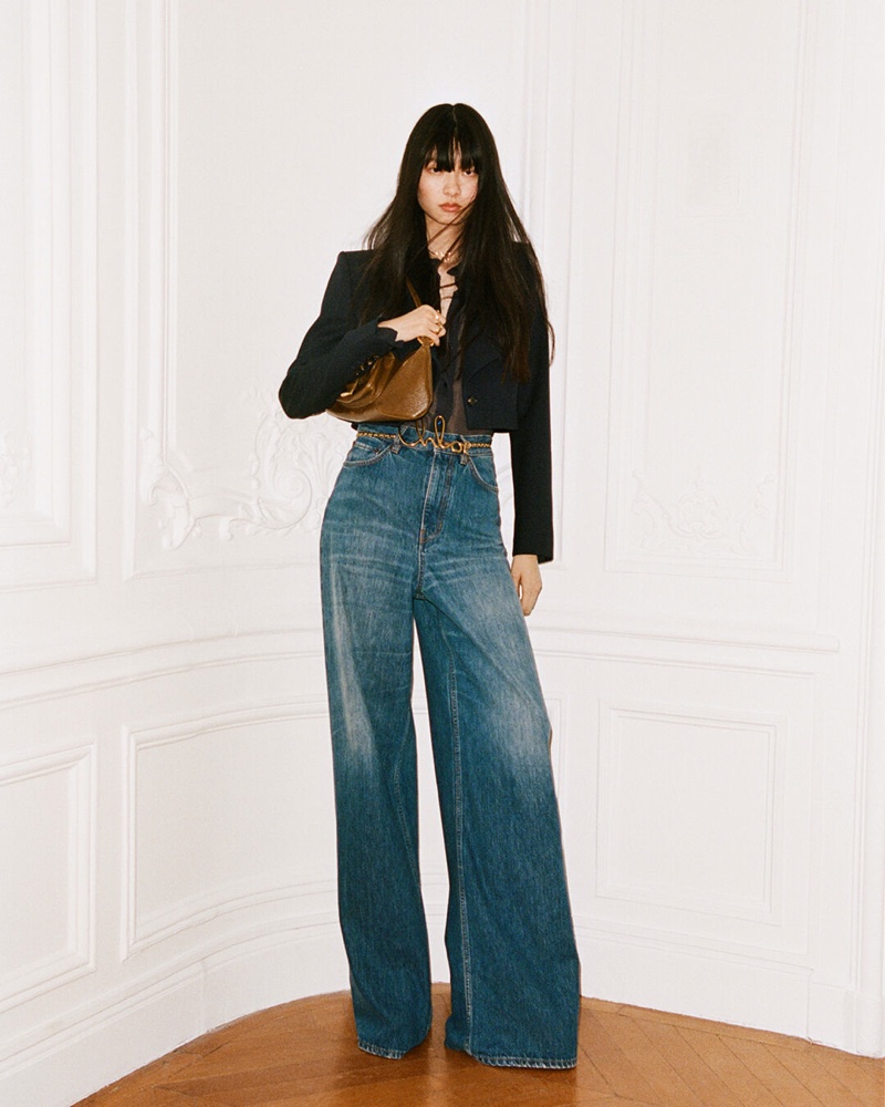 Wide-leg denim balances a fitted and cropped jacket for Chloé pre-fall 2024.