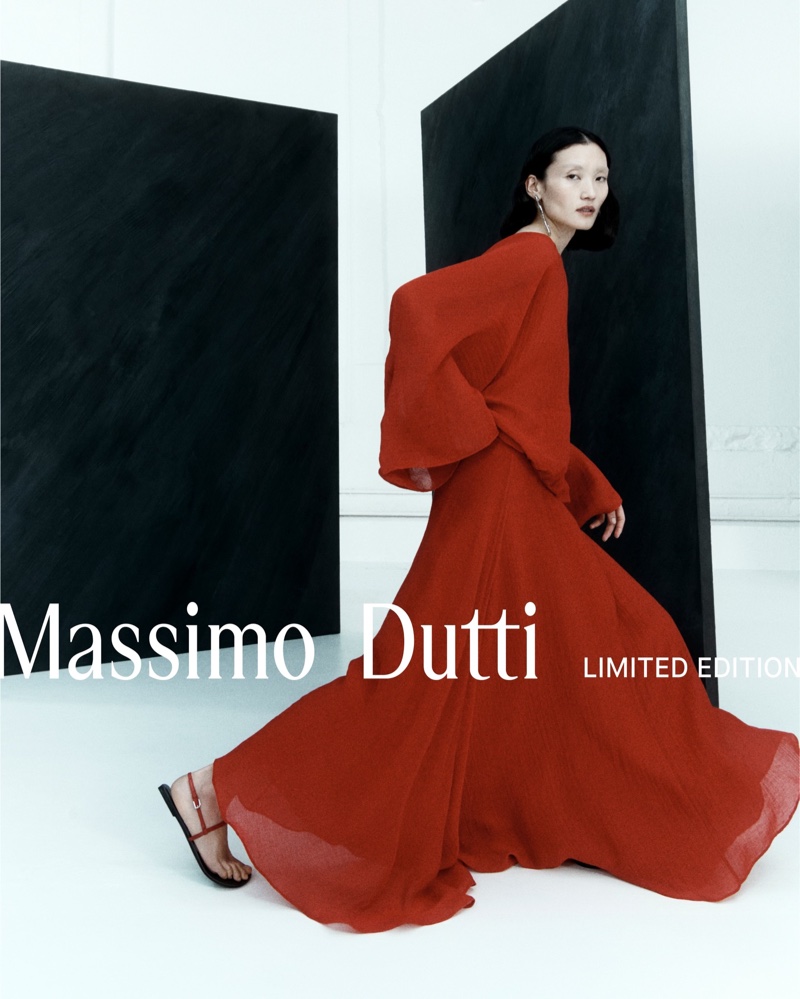 The Massimo Dutti Limited Edition spring 2024 collection presents a fiery red blouse and flowing skirt combination.