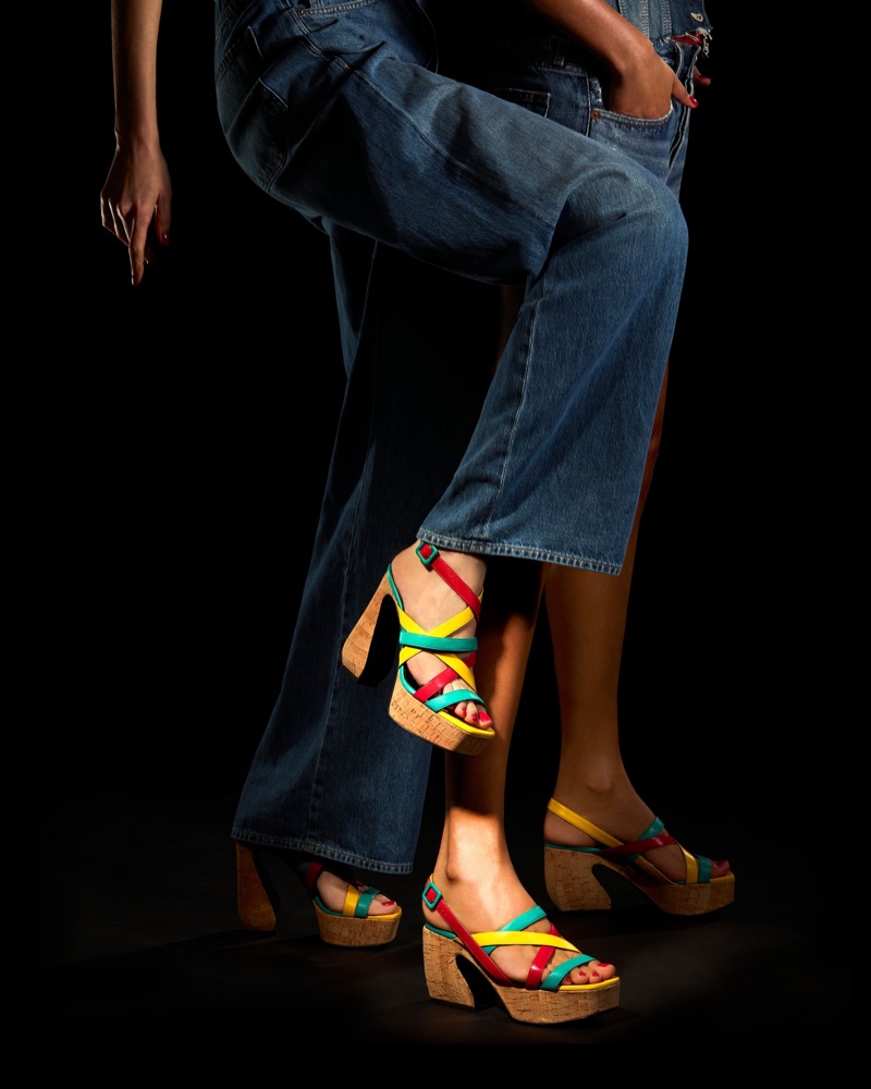 For spring-summer 2024, Si Rossi infuses casual chic with denim flares paired with multicolored sandal heels.
