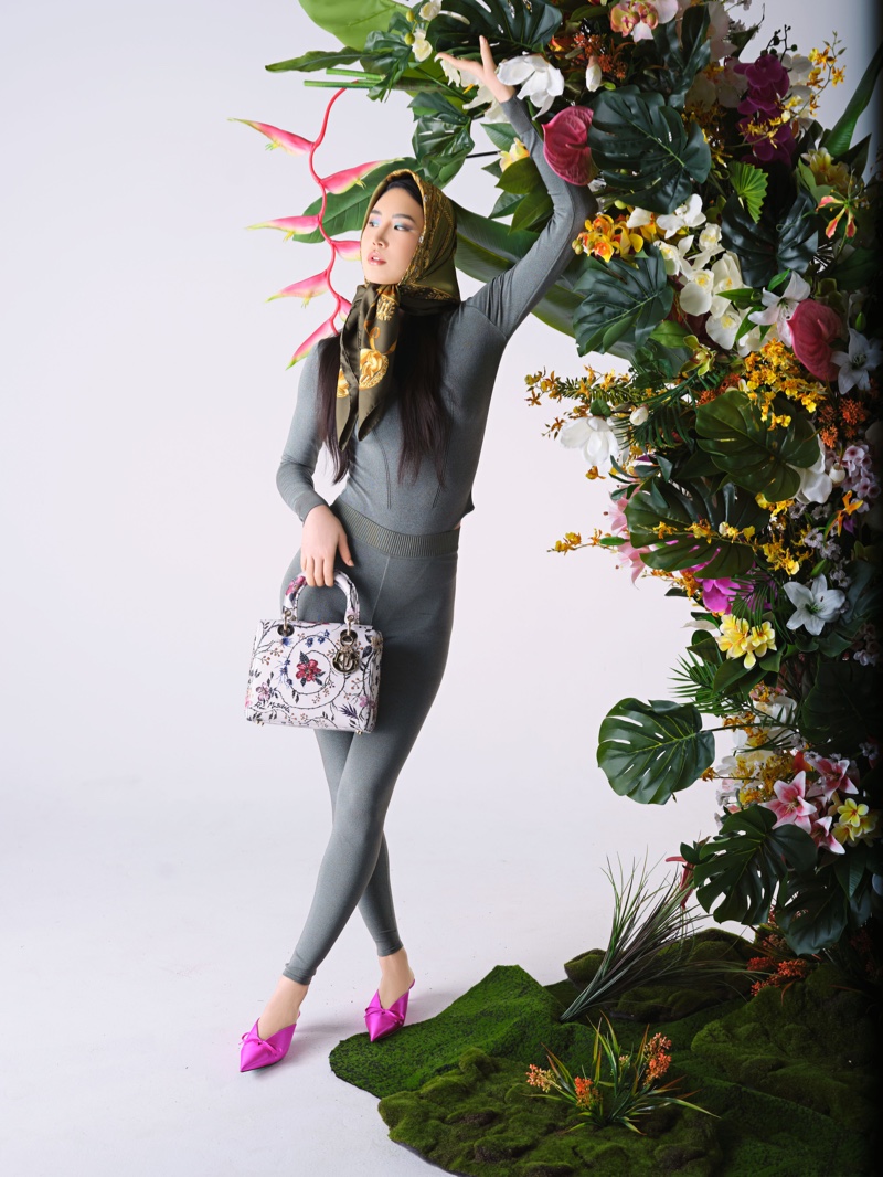 What Goes Around Comes Around ushers in spring 2024 with a grey-scale ensemble, accented by floral designs and pops of pink.