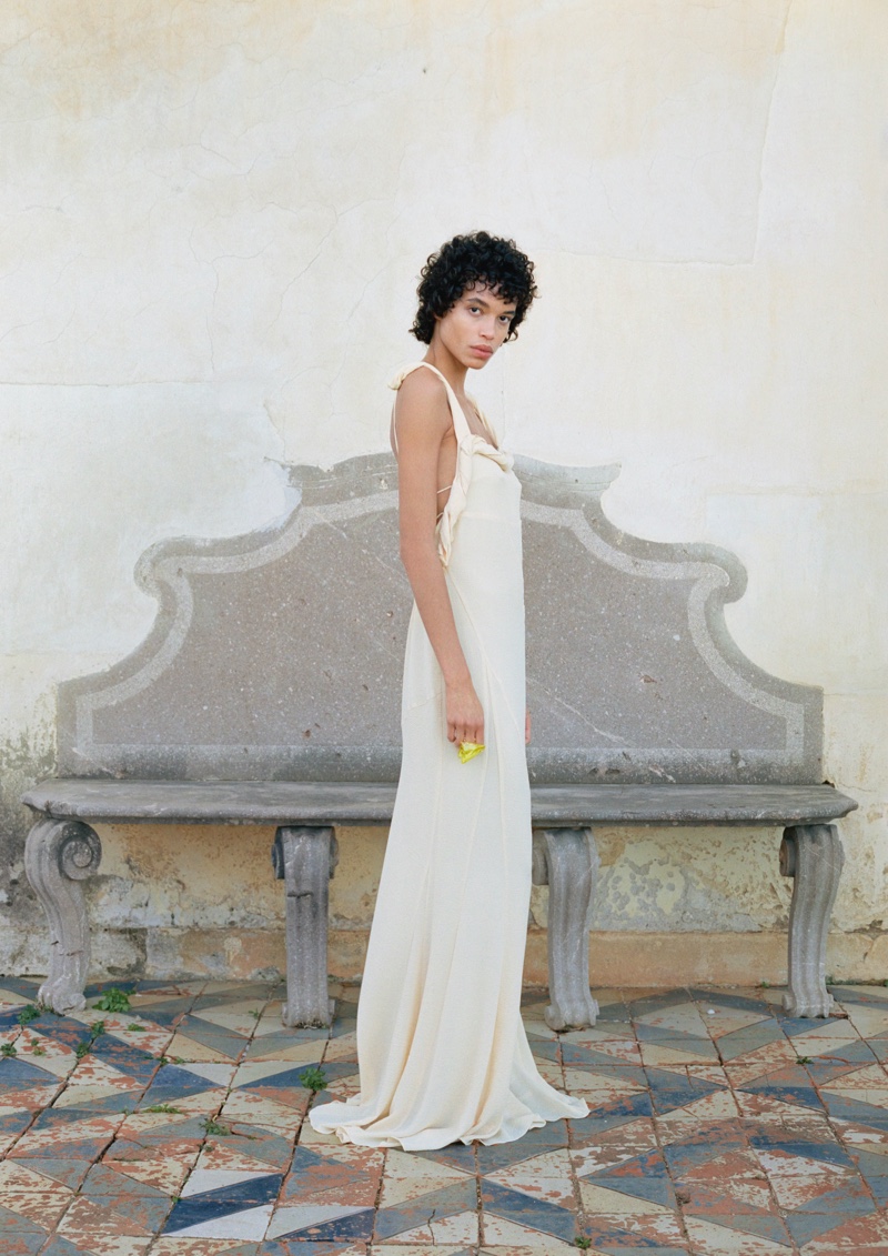 H&M showcases an ethereal white gown from the resort 2024 Studio collection.