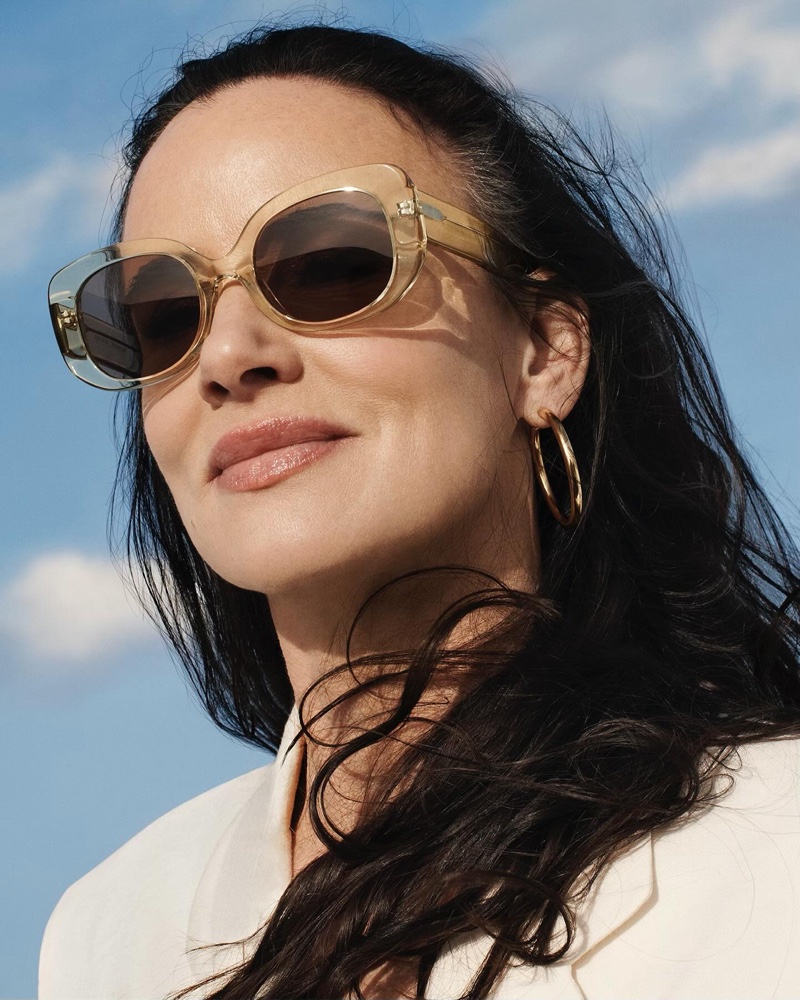Looking retro glam, Juliette Lewis shows off Warby Parker Vilma Sunglasses in Yuzu Crystal.