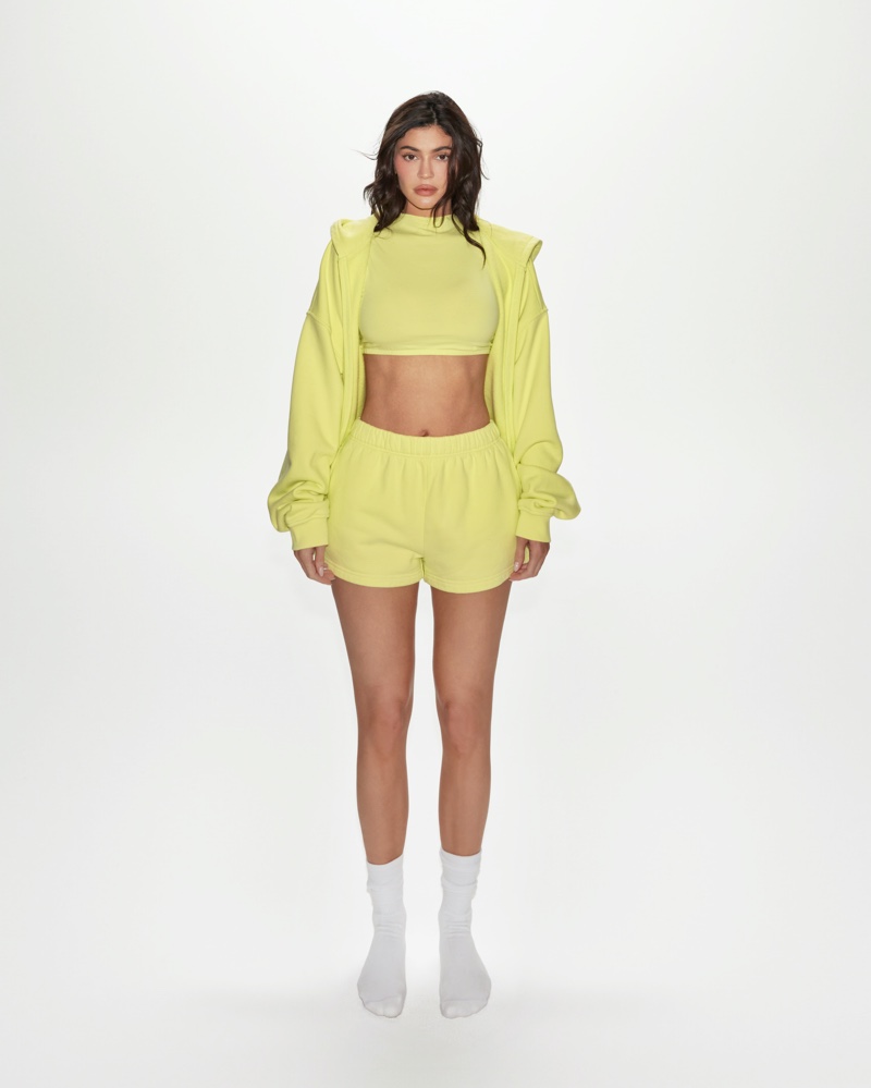Bold and bright, Kylie Jenner turns heads in Khy’s vibrant yellow set, emphasizing comfort.