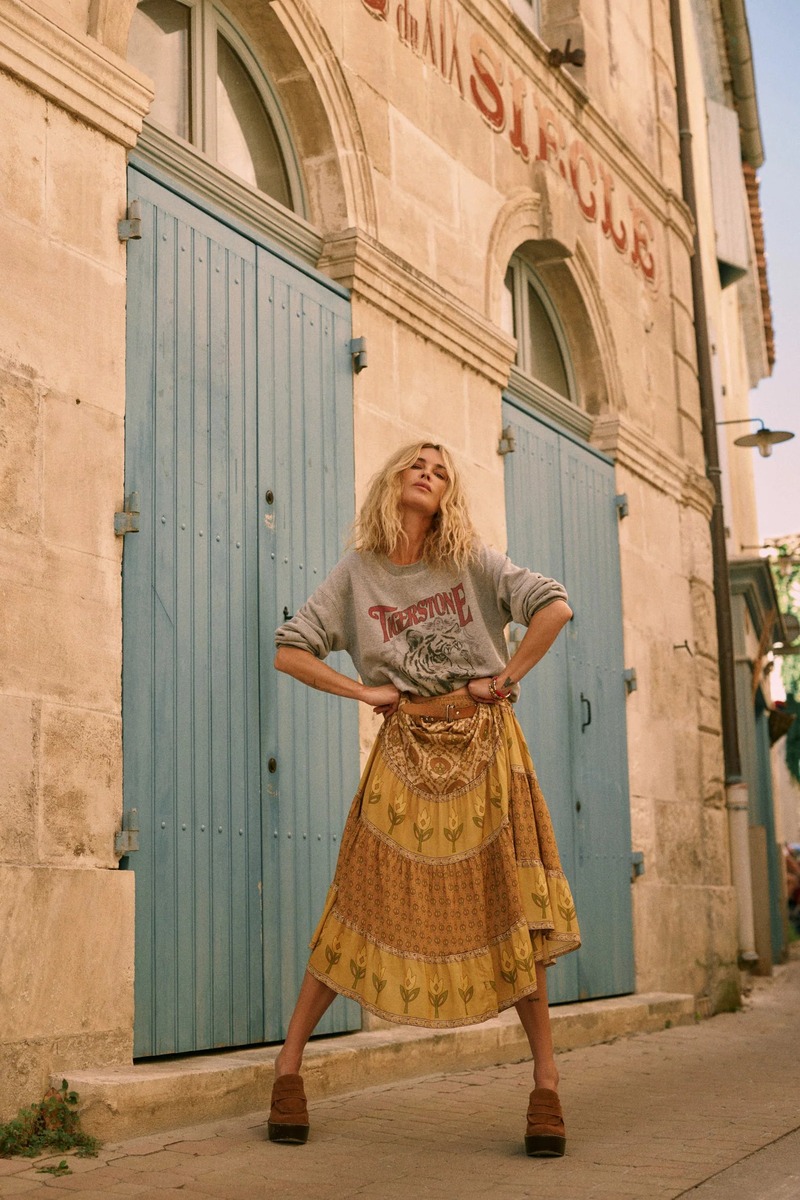 Model Erin Wasson poses effortlessly in a sweatshirt and layered maxi skirt for Spell's recent campaign.