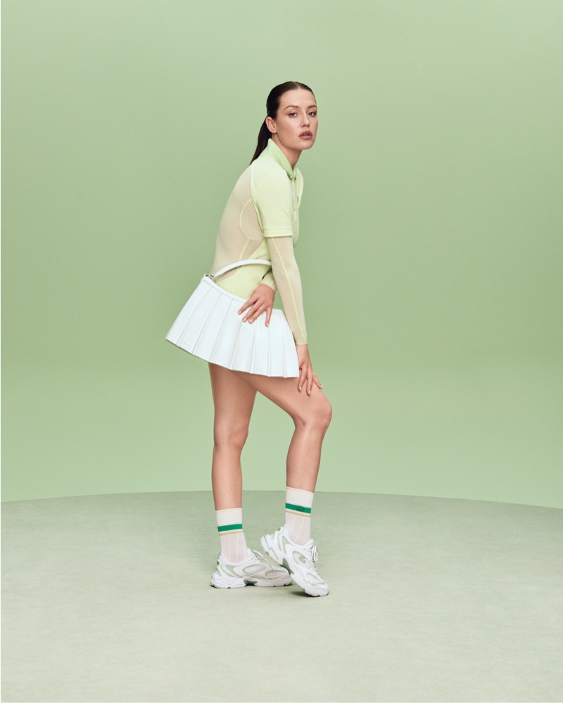 Adèle Exarchopoulos models the Lenglen Bag in Lacoste's Play With Icons campaign.
