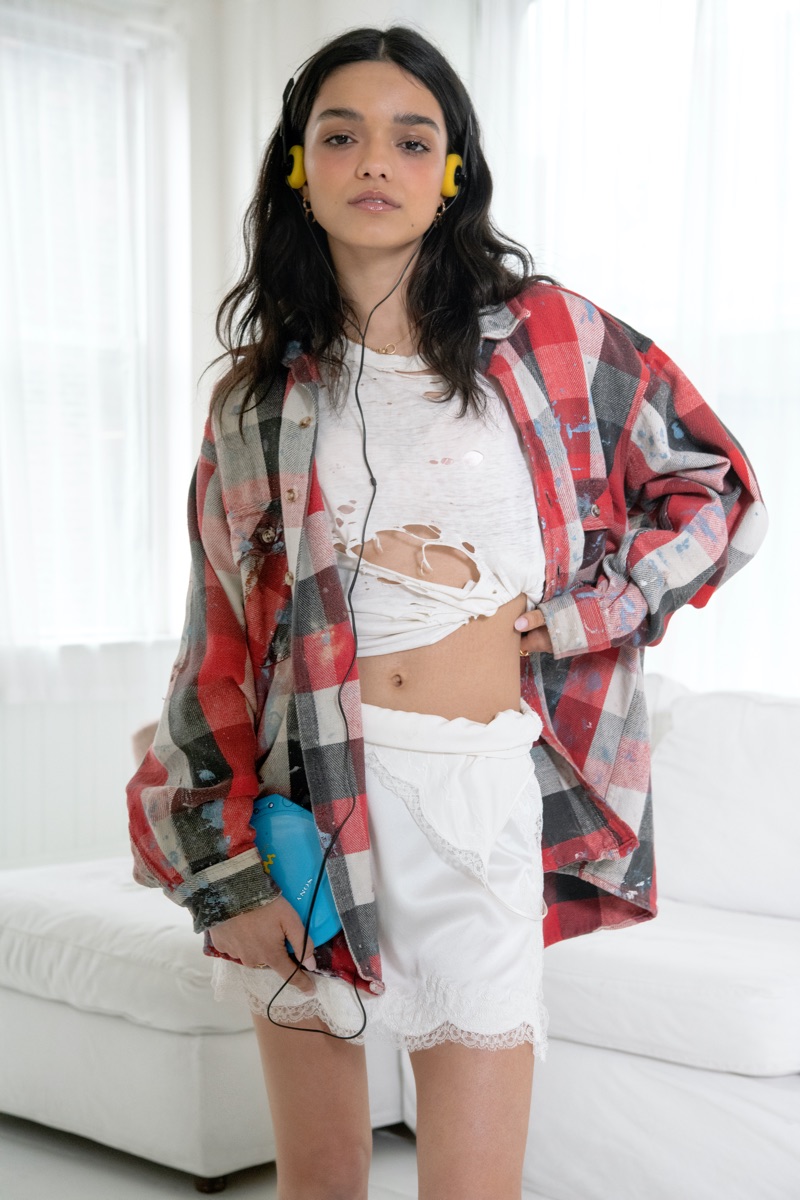Rachel Zegler wears flannel plaid look.